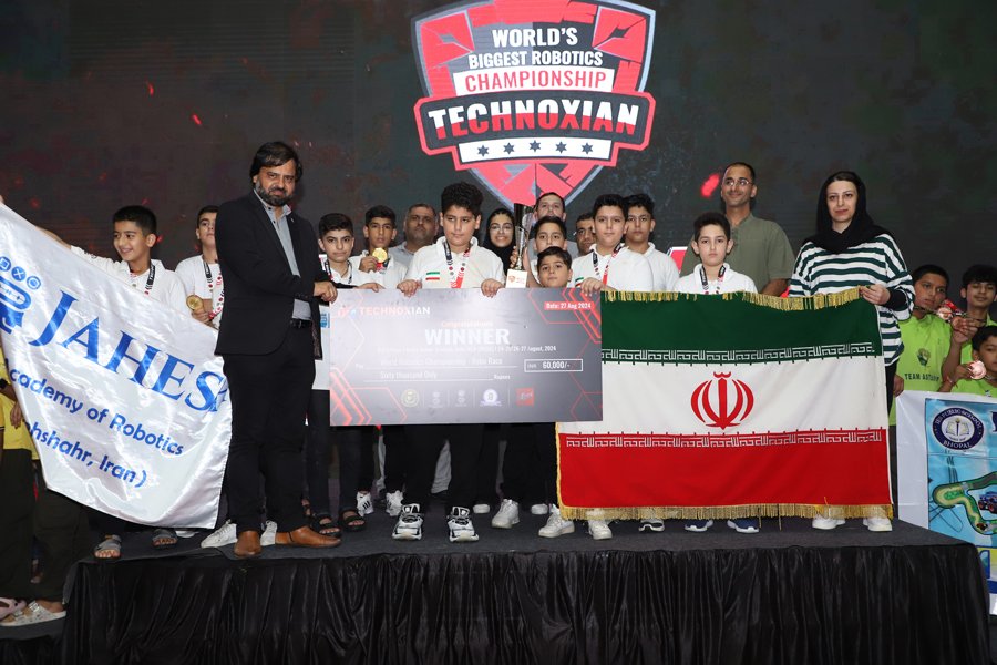 Winners from Jahesh Academy of Robotics, Iran, celebrating victory in World Schools Robo Race at Technoxian 2024